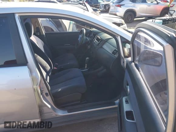 ✅ 2007 Nissan Versa S • VIN: 3N1BC13E17L377174 • Lot: 43605416. Listed on IAAI with 243,672 mi. Free auction sales archive from the USA and detailed vehicle history report at DreamBid. Image 5.