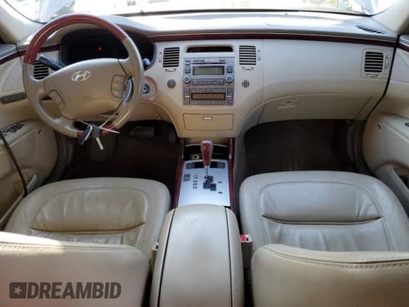 2008 Hyundai Azera Limited с VIN KMHFC46F48A289647, выставлен на аукционе Copart как лот 59970365 с пробегом 163 234 миль миль и Списание • Salvage title. История ставок и продаж доступна на DreamBid. Изображение 8.