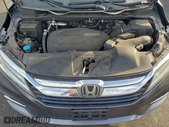 ✅ 2018 Honda Odyssey Touring • VIN: 5FNRL6H85JB029556 • Лот: 94162165. Опубликован ранее на Copart с пробегом 186 037 миль. Бесплатный доступ к архиву аукционных продаж из США и подробный отчёт об истории автомобиля на DreamBid. Изображение 12.