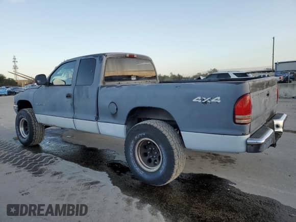 1999 Dodge Dakota SLT с VIN 1B7GG22Y3XS107843, выставлен на аукционе Copart как лот 80652574 с пробегом 187 907 миль миль и Чистый • Clean title. История ставок и продаж доступна на DreamBid. Изображение 2.