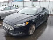 ✅ 2016 Ford Fusion Titanium • VIN: 3FA6P0K91GR135375 • Lot: 43865065. Listed on IAAI with 174,589 mi. Free auction sales archive from the USA and detailed vehicle history report at DreamBid. Image 2.