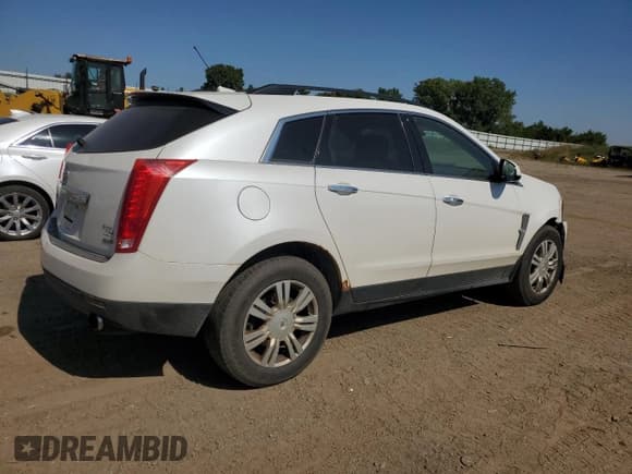 ✅ 2012 Cadillac SRX • VIN: 3GYFNGE38CS569239 • Лот: 80652955. Опубликован ранее на Copart с пробегом 247 825 миль. Бесплатный доступ к архиву аукционных продаж из США и подробный отчёт об истории автомобиля на DreamBid. Изображение 3.