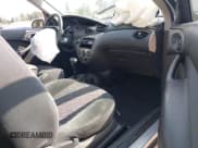 ✅ 2002 Ford Focus ZX3 • VIN: 3FAFP31312R175897 • Лот: 42854981. Опубликован ранее на IAAI с пробегом 63 601 миль. Бесплатный доступ к архиву аукционных продаж из США и подробный отчёт об истории автомобиля на DreamBid. Изображение 5.