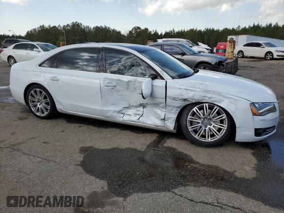 ✅ 2013 Audi A8 4.0L • VIN: WAUR2AFD2DN012478 • Lot: 49733565. Listed on Copart with 115,323 mi. Free auction sales archive from the USA and detailed vehicle history report at DreamBid. Image 4.