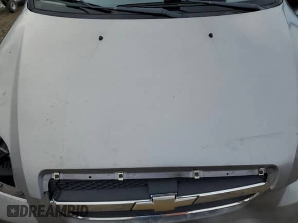 2009 Chevrolet Aveo 2LT z VIN KL1TG56E29B395364, wystawiony jako Copart lot #85162004 z przebiegiem 166 094 mil mil oraz Szkoda całkowita • Salvage title. Historia ofert i sprzedaży dostępna na DreamBid. Obrazek 12.