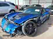 2015 Chevrolet Corvette Z51 3LT z VIN 1G1YL3D75F5113174, wystawiony jako IAAI lot #43237194 z przebiegiem 48 995 mil mil oraz . Historia ofert i sprzedaży dostępna na DreamBid. Obrazek 2.