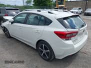 ✅ 2022 Subaru Impreza Premium • VIN: 4S3GTAV60N3700499 • Lot: 42307934. Listed on IAAI with 65,159 mi. Free auction sales archive from the USA and detailed vehicle history report at DreamBid. Image 3.