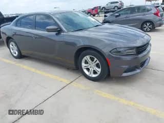 2019 Dodge Charger SXT z VIN 2C3CDXBG7KH707734, wystawiony jako IAAI lot #42659110 z przebiegiem 68 600 mil mil oraz . Historia ofert i sprzedaży dostępna na DreamBid. Obrazek 1.