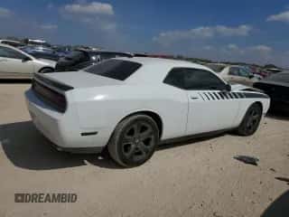 2013 Dodge Challenger SXT z VIN 2C3CDYAG9DH591267, wystawiony jako Copart lot #86849255 z przebiegiem 74 212 mil mil oraz Szkoda całkowita • Salvage title. Historia ofert i sprzedaży dostępna na DreamBid. Obrazek 3.