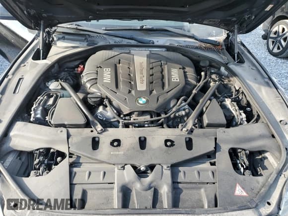 ✅ 2013 BMW 6 Series 650i • VIN: WBAYP9C5XDD168797 • Лот: 58171325. Опубликован ранее на Copart с пробегом Не указан. Бесплатный доступ к архиву аукционных продаж из США и подробный отчёт об истории автомобиля на DreamBid. Изображение 11.