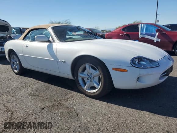 ✅ 1997 Jaguar XK • VIN: SAJGX2745VC002204 • Лот: 82601765. Опубликован ранее на Copart с пробегом 96 265 миль. Бесплатный доступ к архиву аукционных продаж из США и подробный отчёт об истории автомобиля на DreamBid. Изображение 4.