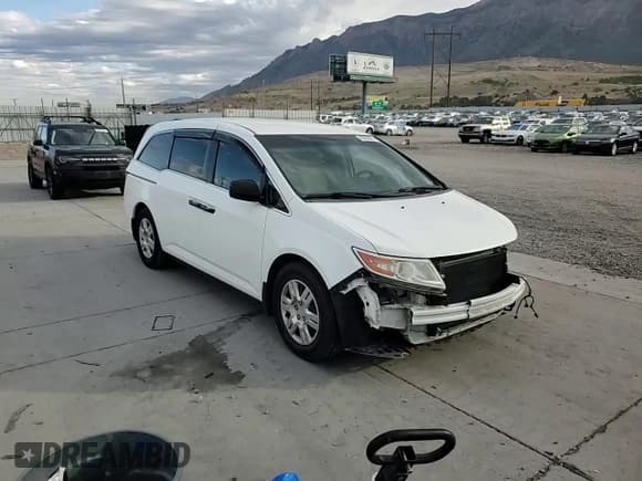 ✅ 2013 Honda Odyssey LX • VIN: 5FNRL5H2XDB082747 • Lot: 80600695. Listed on Copart with 110,873 mi. Free auction sales archive from the USA and detailed vehicle history report at DreamBid. Image 14.