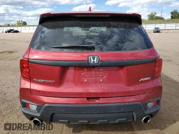 ✅ 2022 Honda Passport EX-L • VIN: 5FNYF8H59NB029196 • Lot: 84275115. Listed on Copart with 72,739 mi. Free auction sales archive from the USA and detailed vehicle history report at DreamBid. Image 6.