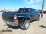 ✅ 2015 Toyota Tacoma • VIN: 3TMLU4EN2FM169326 • Lot: 40689500. Listed on IAAI with 77,003 mi. Free auction sales archive from the USA and detailed vehicle history report at DreamBid. Image 4.