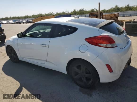 2014 Hyundai Veloster с VIN KMHTC6AD1EU215147, выставлен на аукционе Copart как лот 73018944 с пробегом 108 433 миль миль и Списание • Salvage title. История ставок и продаж доступна на DreamBid. Изображение 2.