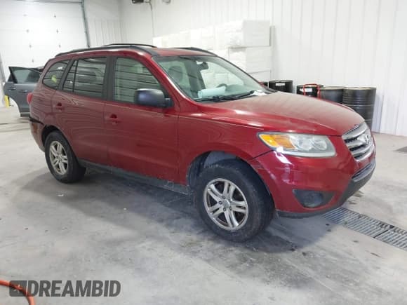 ✅ 2012 Hyundai Santa Fe GLS • VIN: 5XYZGDAG4CG135583 • Lot: 41305409. Listed on IAAI with 155,944 mi. Free auction sales archive from the USA and detailed vehicle history report at DreamBid. Image 1.