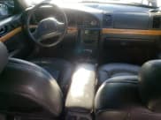 ✅ 1998 Lincoln Continental • VIN: 1LNFM97V7WY637848 • Lot: 43510885. Wystawiony na Copart z przebiegiem 141 796 mil. Bezpłatny archiwum sprzedaży aukcyjnych z USA i szczegółowy raport historii pojazdu na DreamBid. Zdjęcie 8.