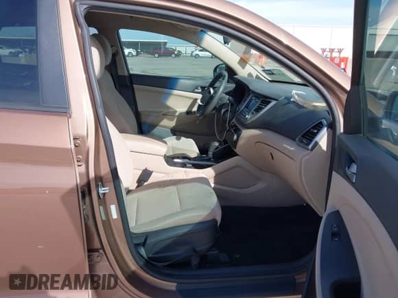 2016 Hyundai Tucson Limited z VIN KM8J33A20GU137662, wystawiony jako IAAI lot #41818149 z przebiegiem 120 010 mil mil oraz . Historia ofert i sprzedaży dostępna na DreamBid. Obrazek 5.