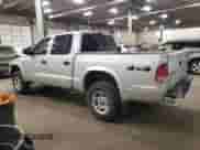 2004 Dodge Dakota Sport с VIN 1D7HG38N34S508009, выставлен на аукционе Copart как лот 42217205 с пробегом 168 446 миль миль и Списание • Salvage title. История ставок и продаж доступна на DreamBid. Изображение 2.