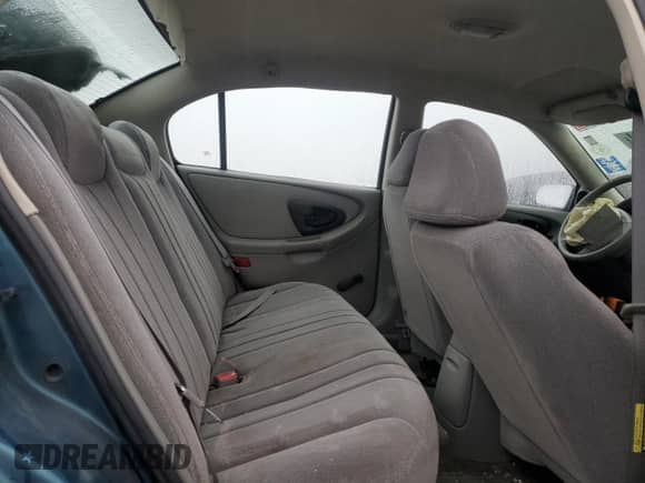 2003 Chevrolet Malibu z VIN 1G1ND52J13M660762, wystawiony jako Copart lot #85143664 z przebiegiem 73 630 mil mil oraz Szkoda całkowita • Salvage title. Historia ofert i sprzedaży dostępna na DreamBid. Obrazek 10.