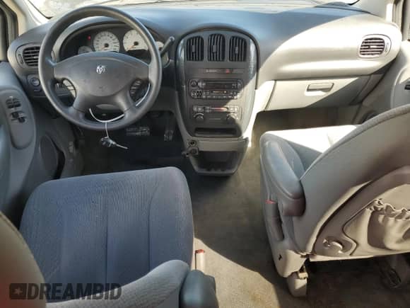 2005 Dodge Caravan SXT с VIN 1D4GP45R85B380101, выставлен на аукционе Copart как лот 77202344 с пробегом 185 107 миль миль и Списание • Salvage title. История ставок и продаж доступна на DreamBid. Изображение 8.