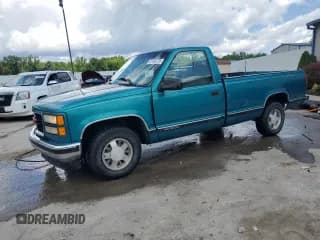 ✅ 1996 GMC Sierra 1500 • VIN: 1GTEC14R5TZ535756 • Лот: 61468735. Опубликован ранее на Copart с пробегом 145 833 миль. Бесплатный доступ к архиву аукционных продаж из США и подробный отчёт об истории автомобиля на DreamBid. Изображение 1.
