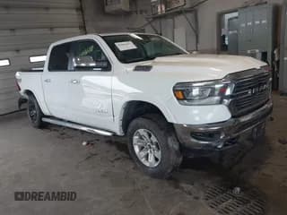 ✅ 2021 Ram 1500 Laramie • VIN: 1C6SRFJT9MN665361 • Lot: 42846481. Listed on IAAI with 90,228 mi. Free auction sales archive from the USA and detailed vehicle history report at DreamBid. Image 1.