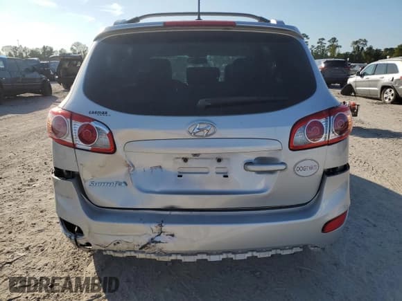 ✅ 2012 Hyundai Santa Fe SE • VIN: 5XYZH4AG5CG097214 • Lot: 80681584. Listed on Copart with 55,806 mi. Free auction sales archive from the USA and detailed vehicle history report at DreamBid. Image 6.