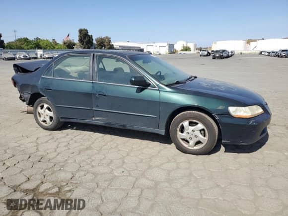 2000 Honda Accord EX with VIN JHMCG6675YC037201, listed as a Copart auction lot 59120345 with 202,552 mi miles and Salvage title. Bid and sale history available at DreamBid. Image 4.