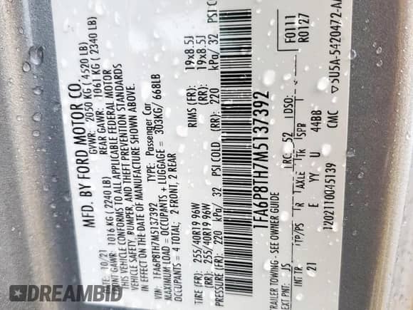 2021 Ford Mustang EcoBoost with VIN 1FA6P8TH7M5137392, listed as a Copart auction lot 64767285 with 100,212 mi miles and Salvage title. Bid and sale history available at DreamBid. Image 13.