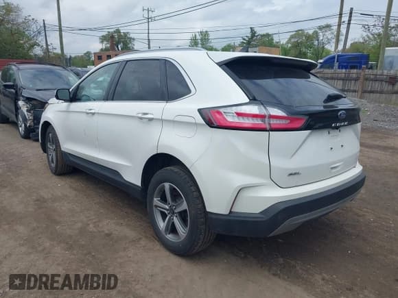 ✅ 2023 Ford Edge SEL • VIN: 2FMPK4J93PBA52725 • Lot: 42265031. Wystawiony na IAAI z przebiegiem 24 793 mil. Bezpłatny archiwum sprzedaży aukcyjnych z USA i szczegółowy raport historii pojazdu na DreamBid. Zdjęcie 3.