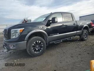 ✅ 2016 Nissan Titan SL • VIN: 1N6BA1F45GN512286 • Lot: 87018685. Wystawiony na Copart z przebiegiem 185 146 mil. Bezpłatny archiwum sprzedaży aukcyjnych z USA i szczegółowy raport historii pojazdu na DreamBid. Zdjęcie 1.