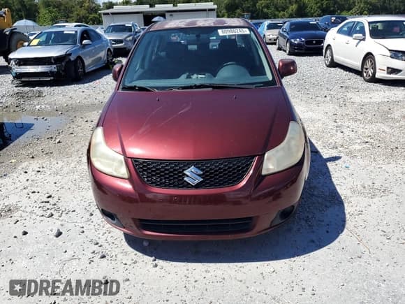 ✅ 2009 Suzuki SX4 FWD • VIN: JS2YC412896200836 • Лот: 80986245. Опубликован ранее на Copart с пробегом 214 579 миль. Бесплатный доступ к архиву аукционных продаж из США и подробный отчёт об истории автомобиля на DreamBid. Изображение 5.