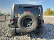 ✅ 2013 Jeep Wrangler Unlimited Sahara • VIN: 1C4BJWEG1DL600805 • Лот: 81133305. Опубликован ранее на Copart с пробегом 165 820 миль. Бесплатный доступ к архиву аукционных продаж из США и подробный отчёт об истории автомобиля на DreamBid. Изображение 6.