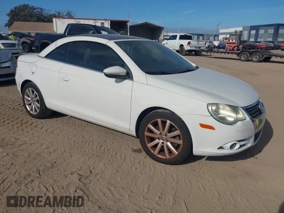 ✅ 2009 Volkswagen Eos Komfort • VIN: WVWBA71F19V015379 • Lot: 43848933. Listed on IAAI with 123,393 mi. Free auction sales archive from the USA and detailed vehicle history report at DreamBid. Image 1.