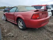 ✅ 2002 Ford Mustang Deluxe • VIN: 1FAFP444X2F209889 • Lot: 86236305. Listed on Copart with 132,131 mi. Free auction sales archive from the USA and detailed vehicle history report at DreamBid. Image 2.