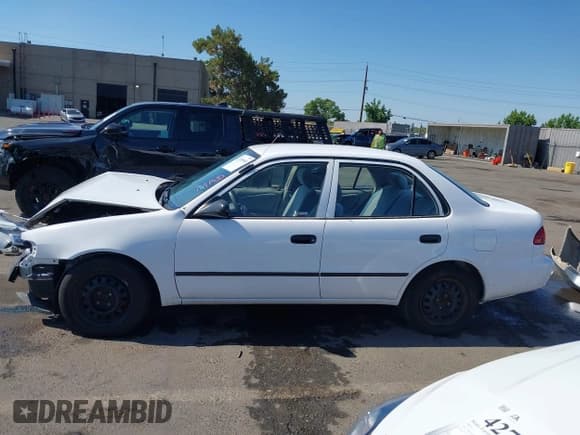 ✅ 1999 Toyota Corolla VE • VIN: 1NXBR12E5XZ199901 • Lot: 42769569. Listed on IAAI with 82,611 mi. Free auction sales archive from the USA and detailed vehicle history report at DreamBid. Image 15.