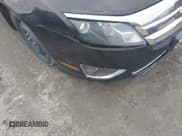 ✅ 2012 Ford Fusion Hybrid • VIN: 3FADP0L32CR157817 • Lot: 43842344. Listed on IAAI with 142,555 mi. Free auction sales archive from the USA and detailed vehicle history report at DreamBid. Image 13.