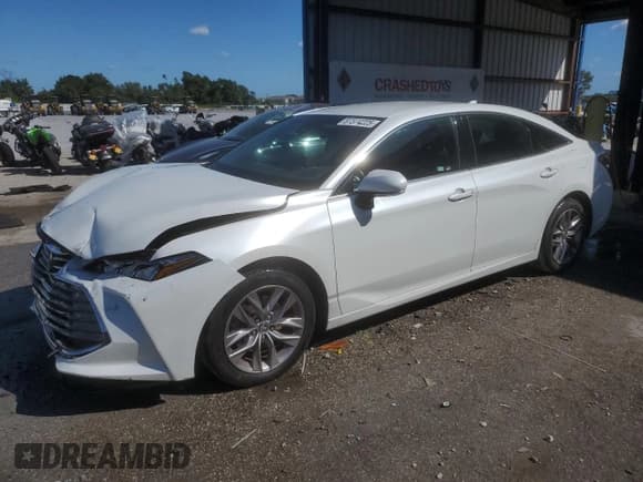 ✅ 2021 Toyota Avalon XLE • VIN: 4T1JZ1FB2MU058288 • Lot: 87374225. Listed on Copart with 82,866 mi. Free auction sales archive from the USA and detailed vehicle history report at DreamBid. Image 1.