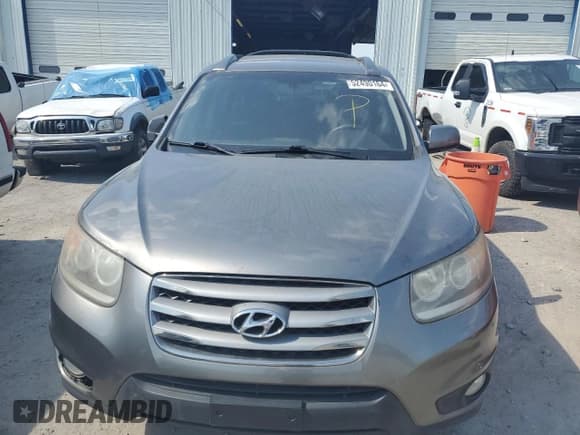 ✅ 2012 Hyundai Santa Fe Limited • VIN: 5XYZK3AB0CG095385 • Lot: 52490164. Listed on Copart with Not provided. Free auction sales archive from the USA and detailed vehicle history report at DreamBid. Image 5.