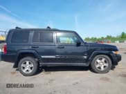 ✅ 2010 Jeep Commander Sport • VIN: 1J4RG4GK2AC118126 • Lot: 42345486. Listed on IAAI with 154,376 mi. Free auction sales archive from the USA and detailed vehicle history report at DreamBid. Image 14.