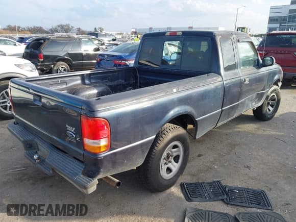 ✅ 1999 Ford Ranger XL • VIN: 1FTYR14VXXPC05122 • Lot: 43719302. Wystawiony na IAAI z przebiegiem 410 039 mil. Bezpłatny archiwum sprzedaży aukcyjnych z USA i szczegółowy raport historii pojazdu na DreamBid. Zdjęcie 4.