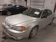 ✅ 2003 Pontiac Grand Am GT • VIN: 1G2NW52E93M605453 • Lot: 41546839. Listed on IAAI with 202,918 mi. Free auction sales archive from the USA and detailed vehicle history report at DreamBid. Image 2.