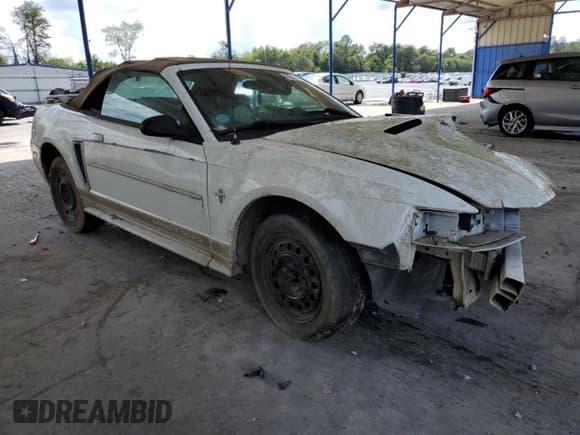 ✅ 2002 Ford Mustang Deluxe • VIN: 1FAFP44412F113486 • Lot: 69901725. Listed on Copart with 214,518 mi. Free auction sales archive from the USA and detailed vehicle history report at DreamBid. Image 4.