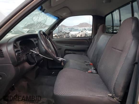 2001 Dodge 1500 Work Special с VIN 1B7HC16X51S300496, выставлен на аукционе Copart как лот 80561284 с пробегом 125 279 миль миль и Списание • Salvage title. История ставок и продаж доступна на DreamBid. Изображение 7.