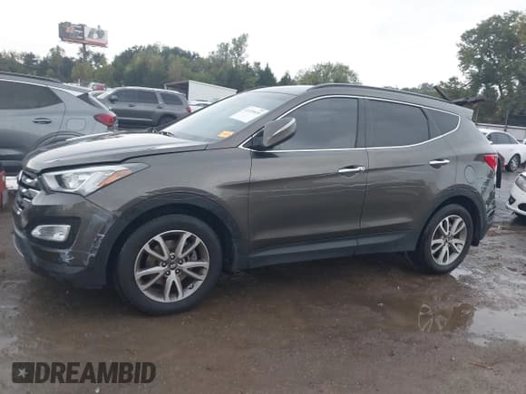✅ 2014 Hyundai Santa Fe • VIN: 5XYZUDLA7EG129359 • Лот: 43430830. Опубликован ранее на IAAI с пробегом 119 254 миль. Бесплатный доступ к архиву аукционных продаж из США и подробный отчёт об истории автомобиля на DreamBid. Изображение 14.