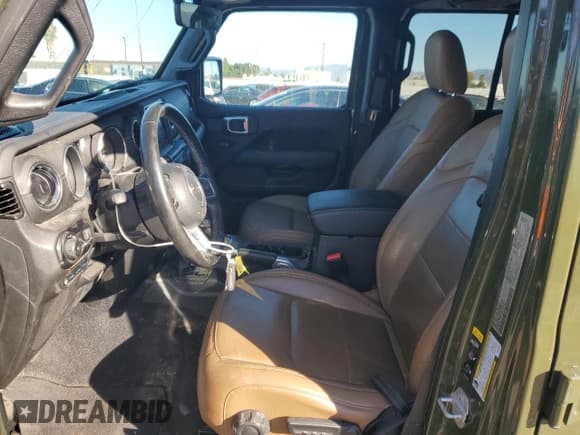 ✅ 2023 Jeep Wrangler Sahara • VIN: 1C4JJXP60PW568499 • Лот: 87244015. Опубликован ранее на Copart с пробегом 59 334 миль. Бесплатный доступ к архиву аукционных продаж из США и подробный отчёт об истории автомобиля на DreamBid. Изображение 7.