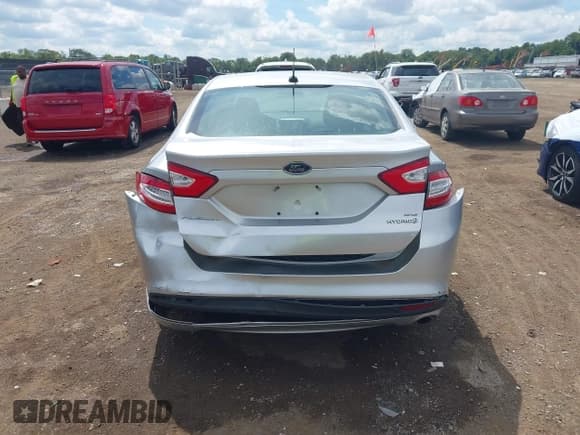 ✅ 2014 Ford Fusion SE Hybrid • VIN: 3FA6P0LU9ER394275 • Лот: 43085443. Опубликован ранее на IAAI с пробегом 160 483 миль. Бесплатный доступ к архиву аукционных продаж из США и подробный отчёт об истории автомобиля на DreamBid. Изображение 6.