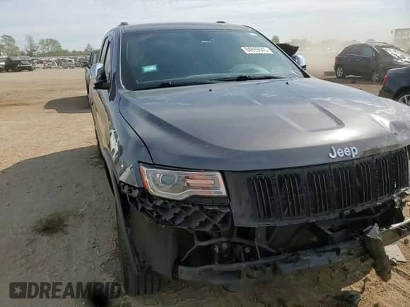 2014 Jeep Grand Cherokee Limited z VIN 1C4RJFBG1EC425802, wystawiony jako Copart lot #84869645 z przebiegiem 220 656 mil mil oraz Szkoda całkowita • Salvage title. Historia ofert i sprzedaży dostępna na DreamBid. Obrazek 14.
