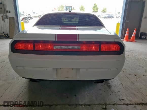 2014 Dodge Challenger Rallye Redline with VIN 2C3CDYAG7EH306440, listed as a Copart auction lot 66965075 with 92,041 mi miles and Salvage title. Bid and sale history available at DreamBid. Image 6.